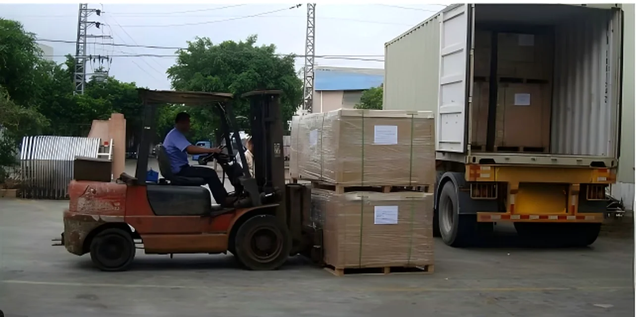 Forklift loading palletised finished goods into an export container at the Dongguan factory