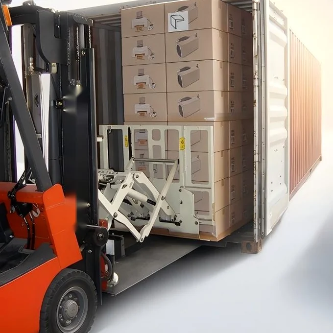 Appliance cartons on a slip sheet being loaded into a container by a push-pull attachment